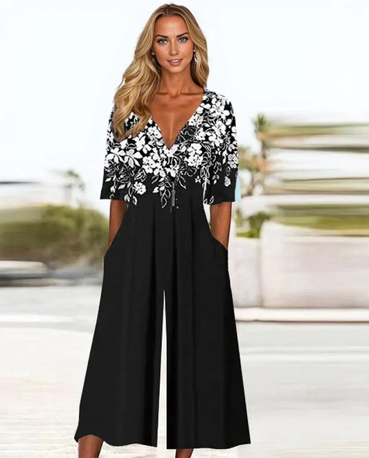 Mono negro floral – Mono elegante con estampado y mangas cortas