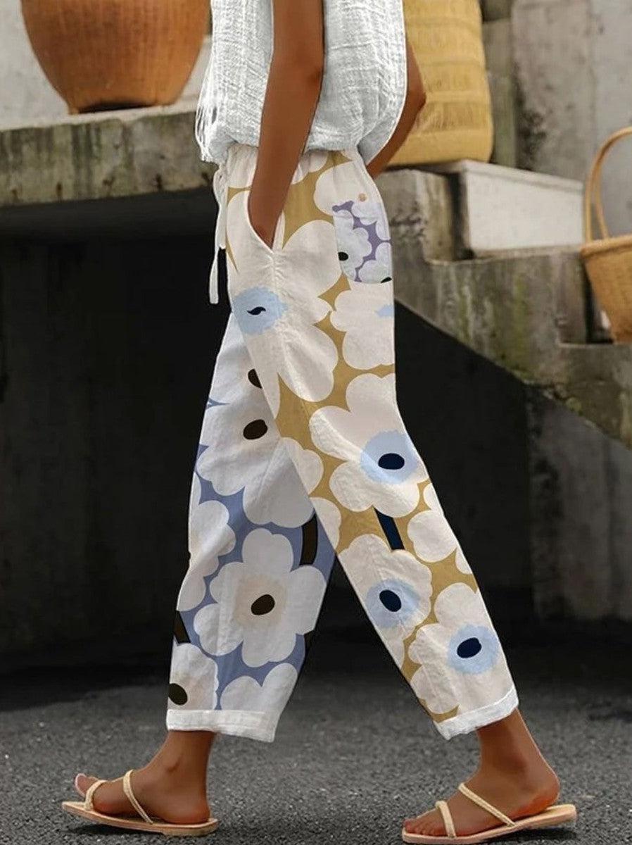 Pantalones elegantes con estampado y bolsillos laterales